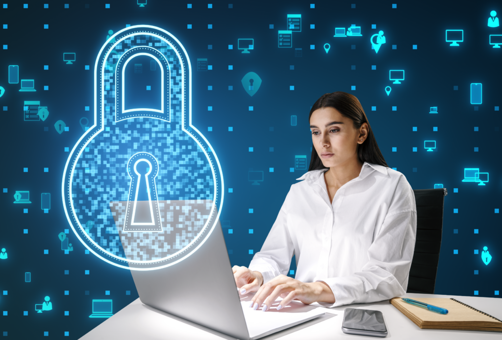 Woman at laptop, screen shows security software interface